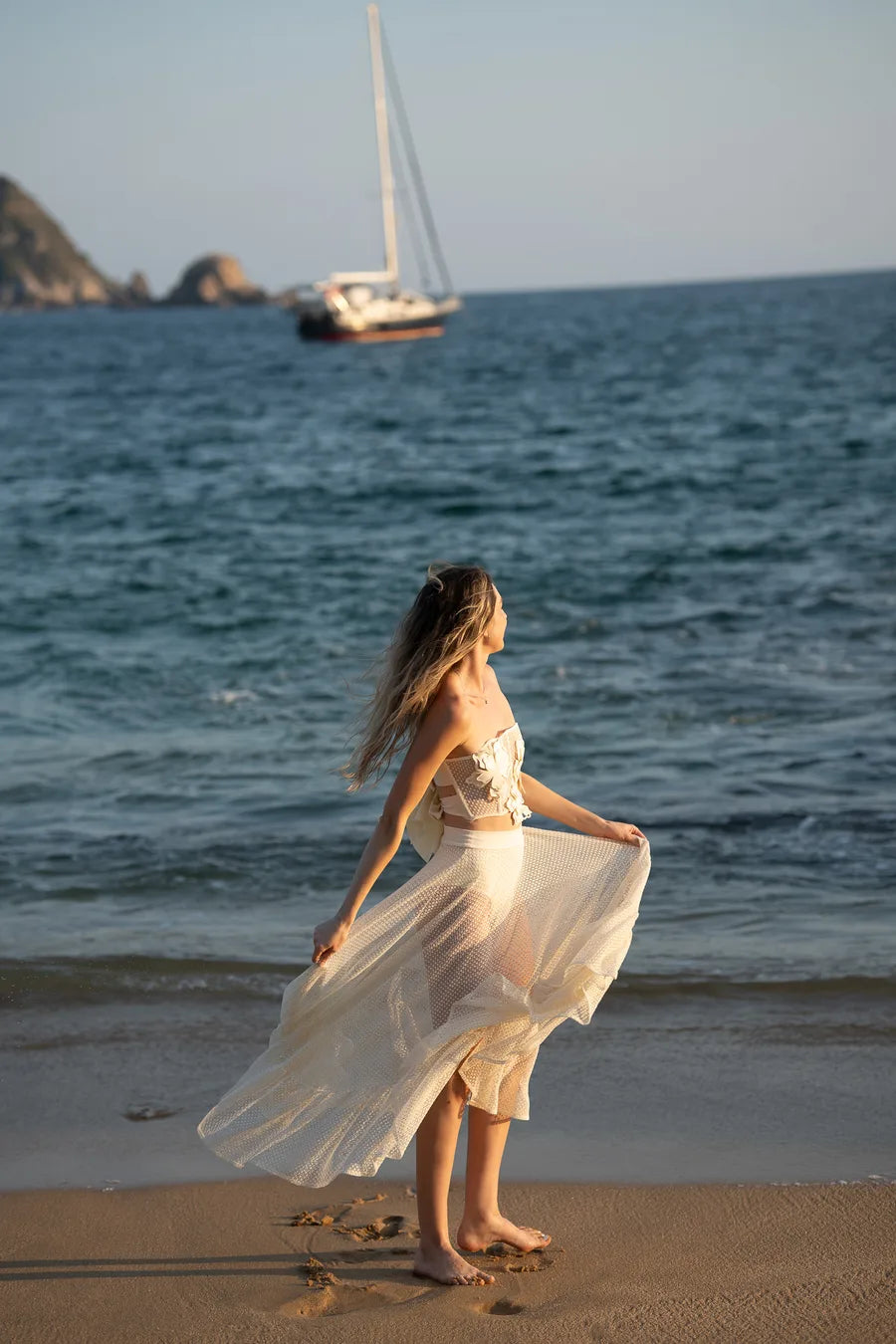 Ari on the beach at sunset in Huatulco